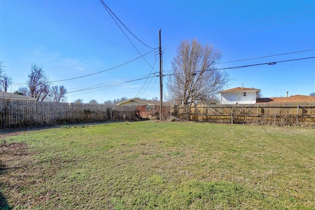 view of yard featuring a fenced backyard