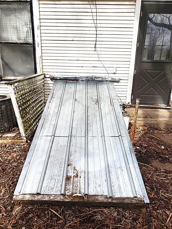 view of entry to storm shelter