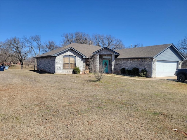 single story home with an attached garage, a front lawn, a shingled roof, and brick siding