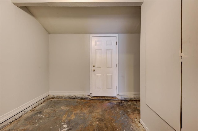 spare room featuring baseboards