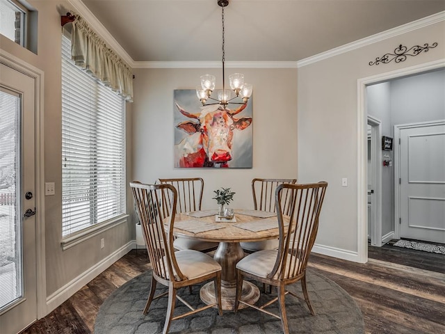 dining room featuring dark wood-style flooring, a notable chandelier, crown molding, and baseboards