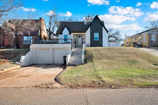 view of front of house featuring driveway and board and batten siding