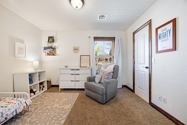 bedroom with carpet, visible vents, and baseboards