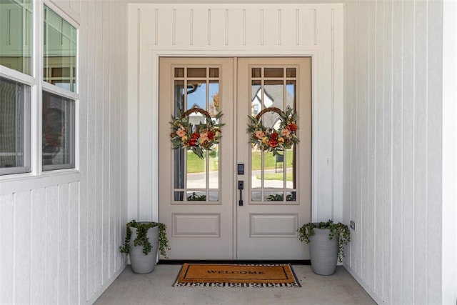 entrance to property featuring french doors