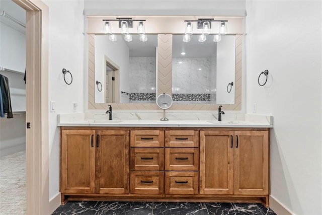 full bathroom featuring marble finish floor, double vanity, a sink, and tasteful backsplash