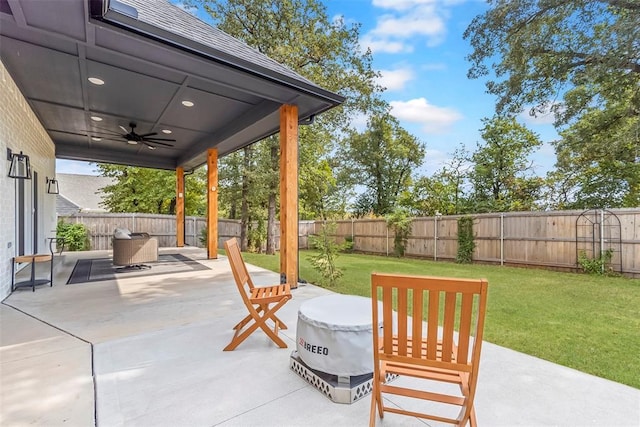 view of patio with a ceiling fan and a fenced backyard