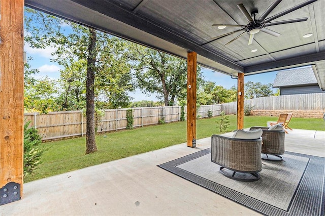 view of patio featuring ceiling fan and a fenced backyard