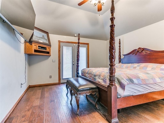 bedroom with lofted ceiling, a ceiling fan, baseboards, and hardwood / wood-style floors