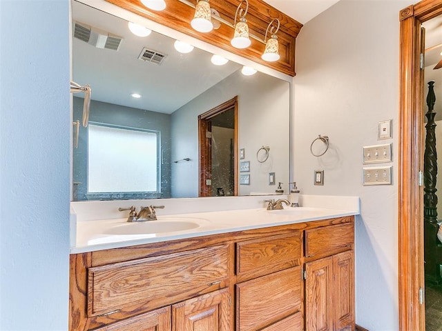 full bathroom featuring visible vents, a sink, and double vanity