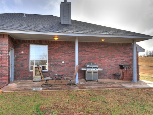 view of patio / terrace featuring fence and area for grilling