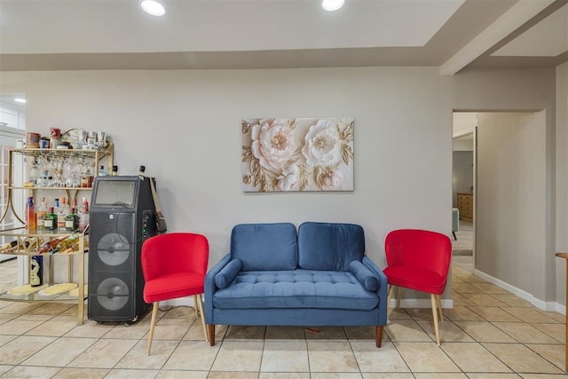 living area featuring tile patterned flooring, baseboards, and recessed lighting