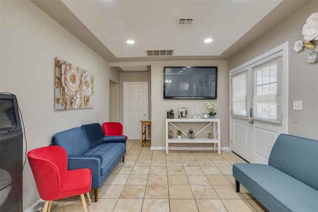 interior space with recessed lighting, visible vents, baseboards, and light tile patterned floors