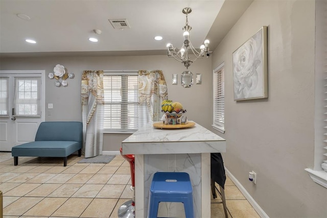 dining room with light tile patterned floors, recessed lighting, visible vents, and baseboards