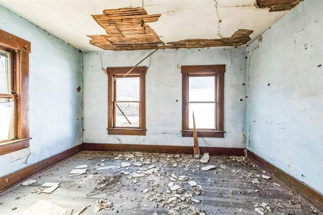 interior space featuring baseboards