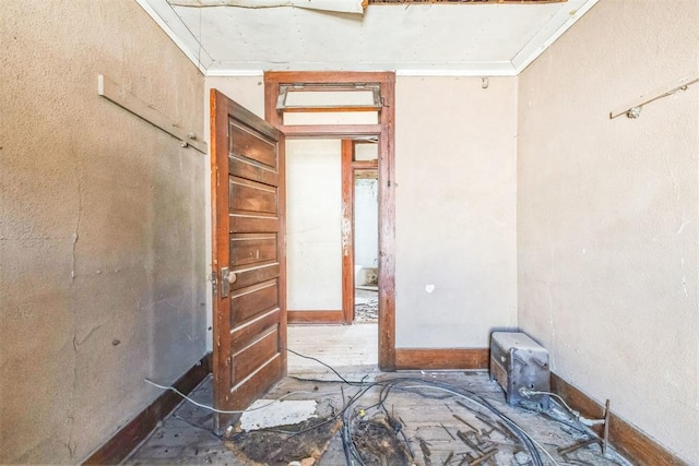 interior space with crown molding