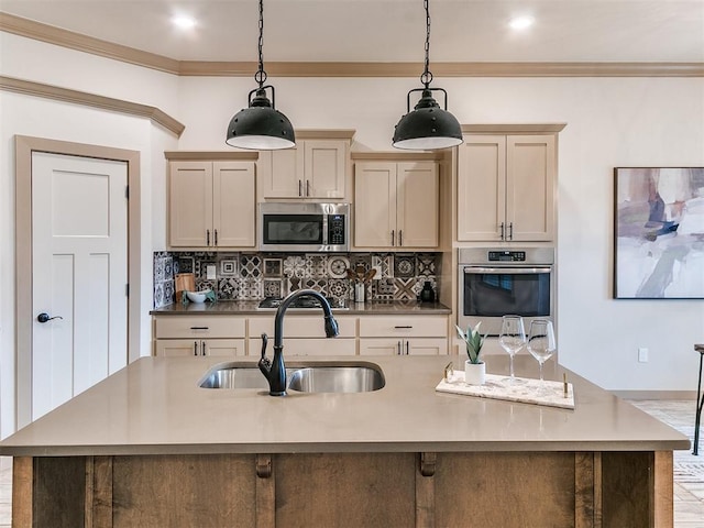 kitchen with pendant lighting, a sink, appliances with stainless steel finishes, tasteful backsplash, and crown molding