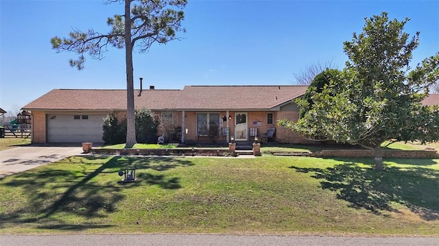 single story home featuring brick siding, a front lawn, roof with shingles, driveway, and an attached garage