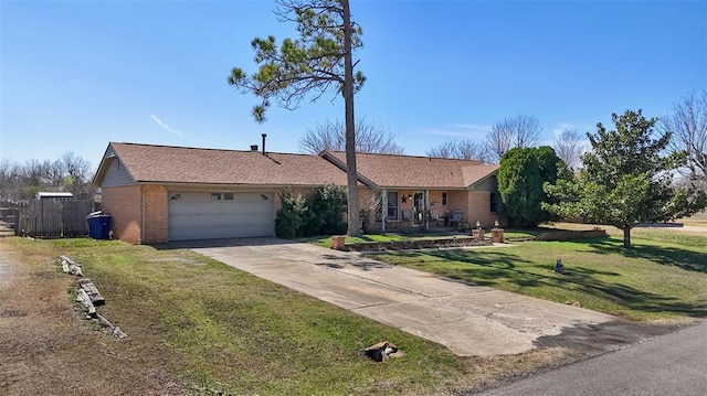 ranch-style home with driveway, fence, a front yard, a garage, and brick siding