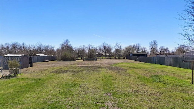 view of yard featuring fence