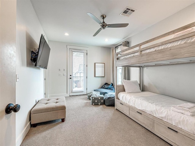 bedroom with access to outside, carpet, visible vents, and baseboards