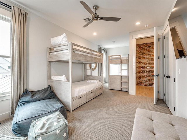 bedroom with light carpet, visible vents, a ceiling fan, and recessed lighting