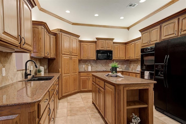 kitchen featuring light stone counters, a kitchen island, open shelves, a sink, and black appliances