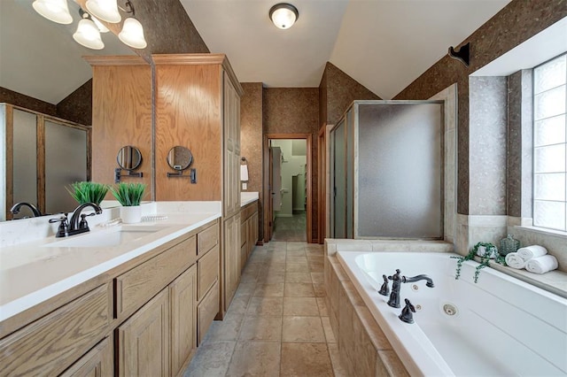 full bath with tile patterned flooring, a shower stall, double vanity, a tub with jets, and a sink