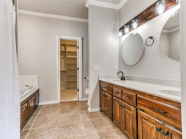 full bath with a tub to relax in, double vanity, toilet, and crown molding