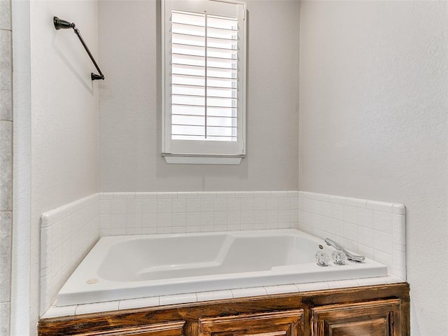 full bathroom featuring a bath