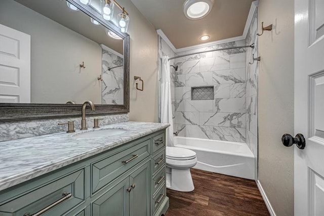 full bathroom featuring shower / bath combination with curtain, toilet, vanity, wood finished floors, and baseboards