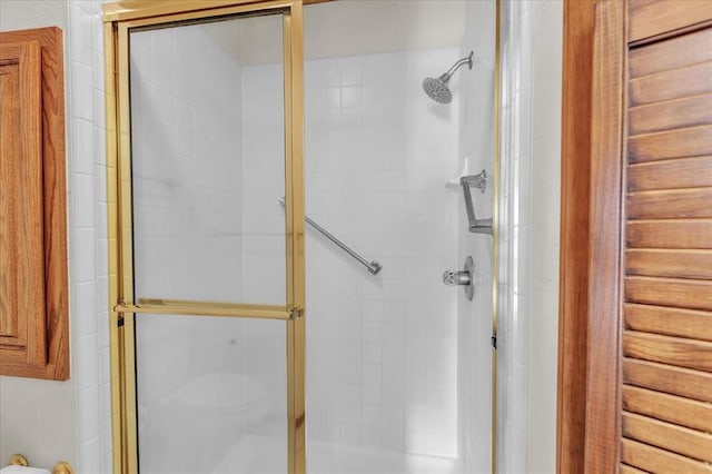 bathroom featuring a stall shower