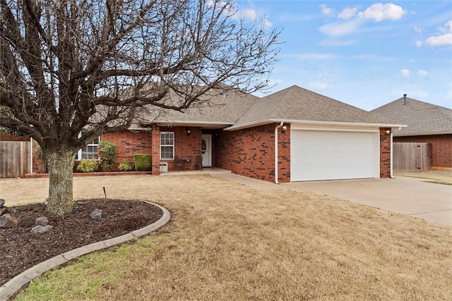 single story home with roof with shingles, an attached garage, fence, a front yard, and brick siding