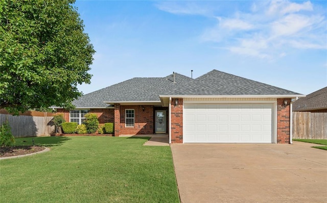 501 N Cherokee Way, Mustang, OK 73064 - single story home with concrete driveway, an attached garage, roof with shingles, and brick siding