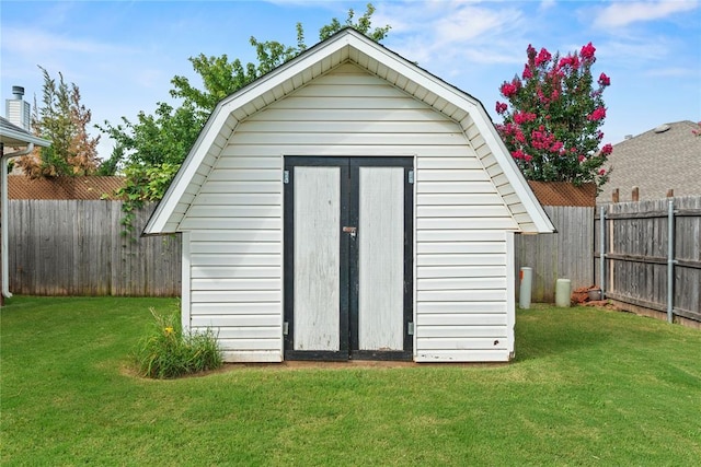 501 N Cherokee Way, Mustang, OK 73064 - view of shed featuring a fenced backyard