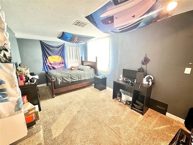 carpeted bedroom with visible vents, a textured wall, a textured ceiling, and baseboards