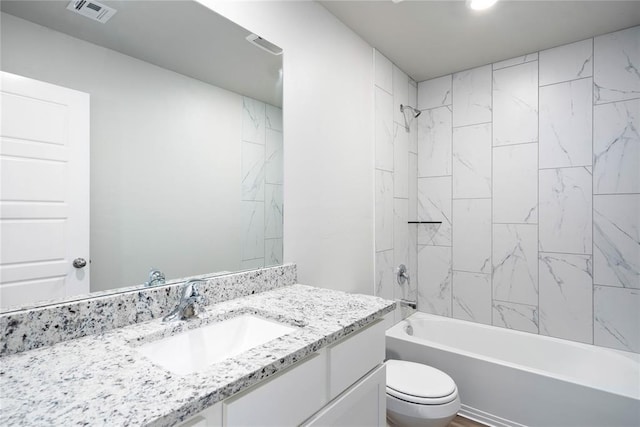 full bath featuring toilet, vanity, visible vents, and shower / bathing tub combination