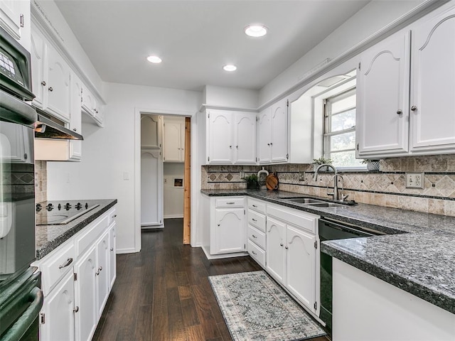 2900 Wilton Ln, Oklahoma City, OK 73120 - kitchen featuring a sink, black electric cooktop, white cabinetry, decorative backsplash, and recessed lighting