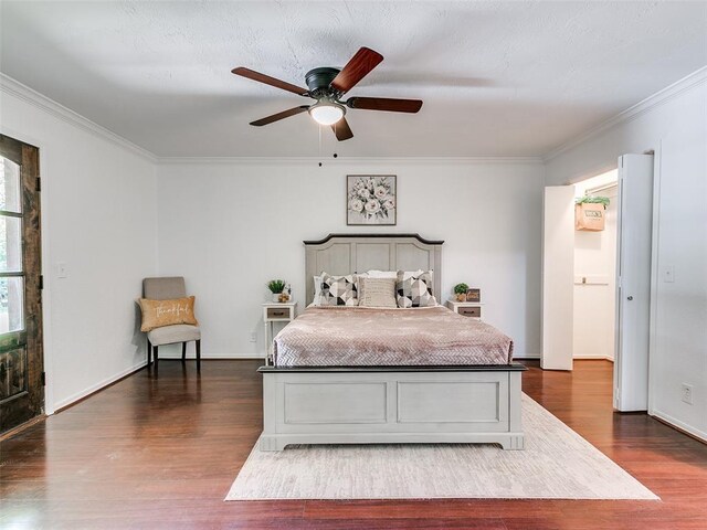 2900 Wilton Ln, Oklahoma City, OK 73120 - bedroom featuring dark wood-style floors, ornamental molding, a ceiling fan, and baseboards