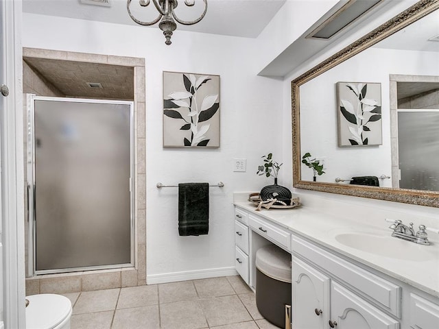 2900 Wilton Ln, Oklahoma City, OK 73120 - bathroom with tile patterned floors, a shower stall, vanity, and baseboards