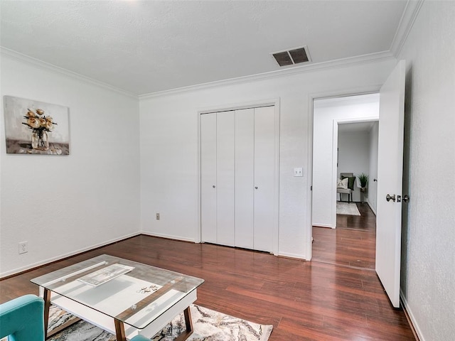 2900 Wilton Ln, Oklahoma City, OK 73120 - living area with ornamental molding, wood finished floors, and baseboards