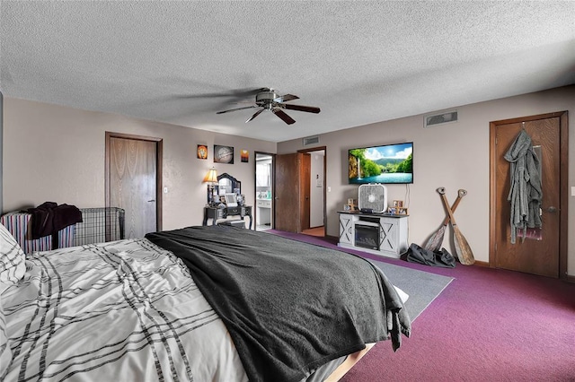 bedroom with visible vents, ceiling fan, a textured ceiling, and carpet flooring