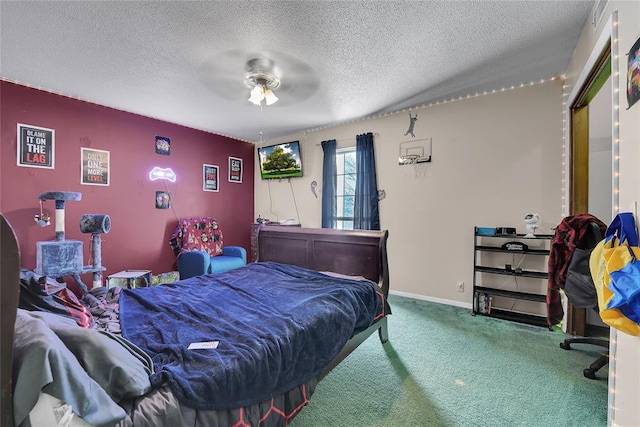 bedroom with carpet, baseboards, ceiling fan, and a textured ceiling