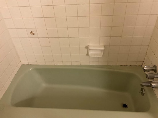 full bath with a washtub