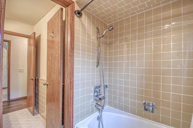 bathroom with shower / bath combination