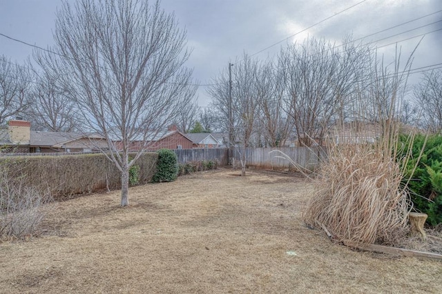 view of yard with fence