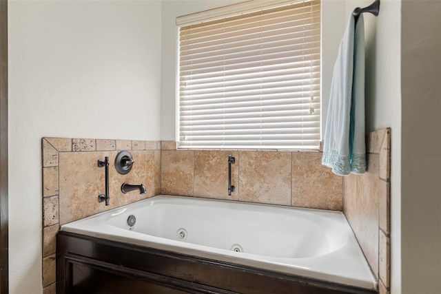 bathroom with a jetted tub