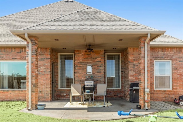 view of patio / terrace featuring ceiling fan and area for grilling