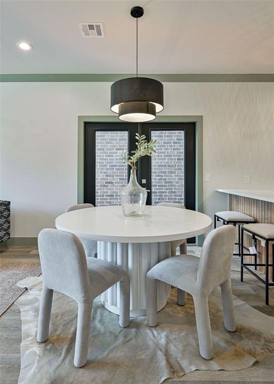 dining area featuring visible vents and recessed lighting