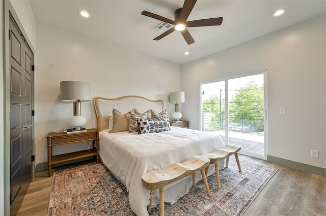 bedroom featuring access to exterior, recessed lighting, visible vents, light wood-style flooring, and baseboards