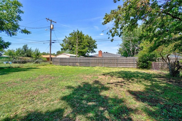 view of yard featuring fence